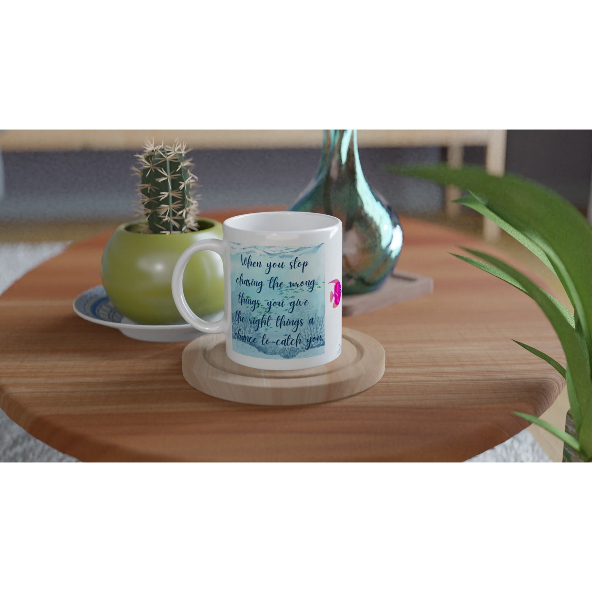 "When you stop chasing the wrong things" 11 oz. Mug on table